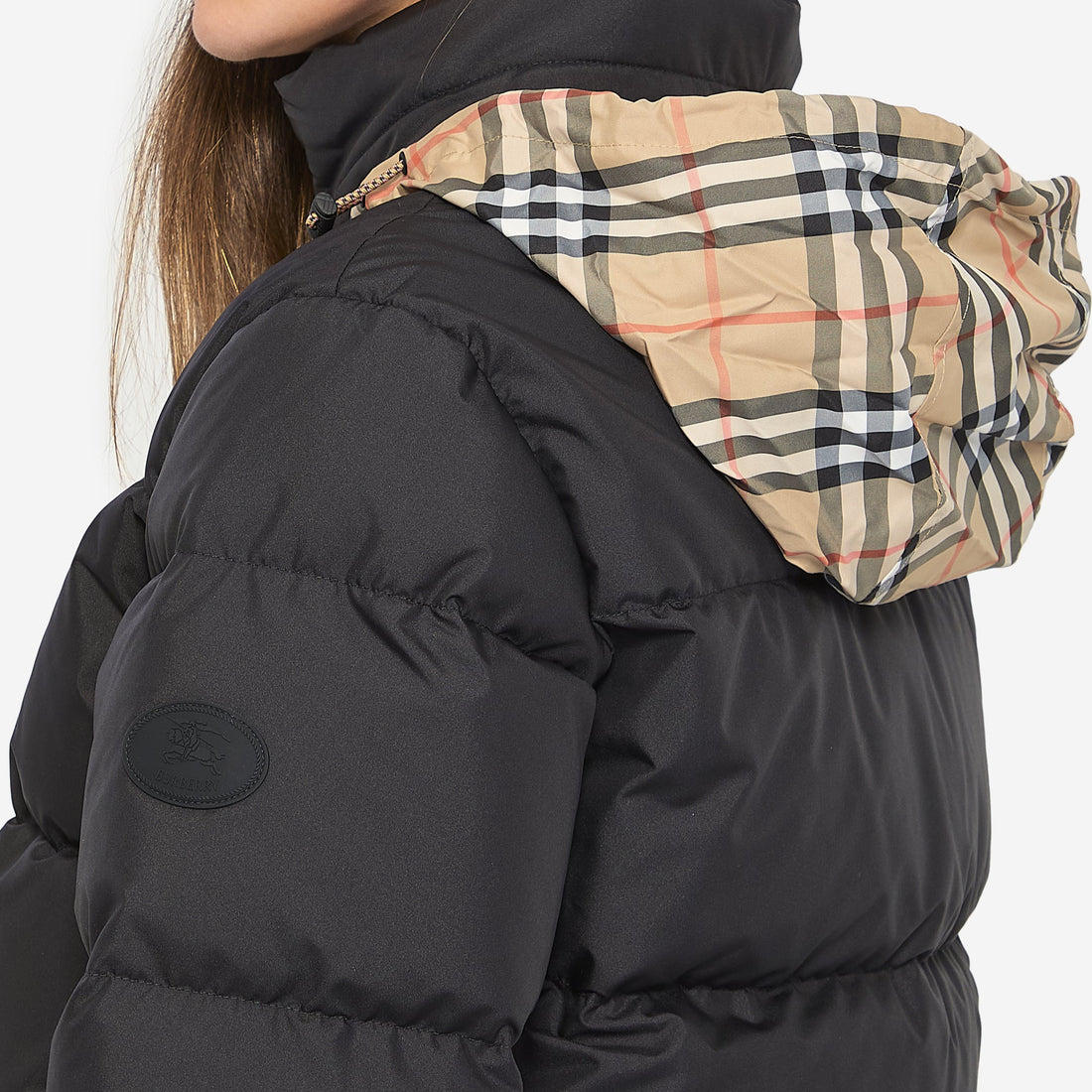 Puffer jacket with concealed hood