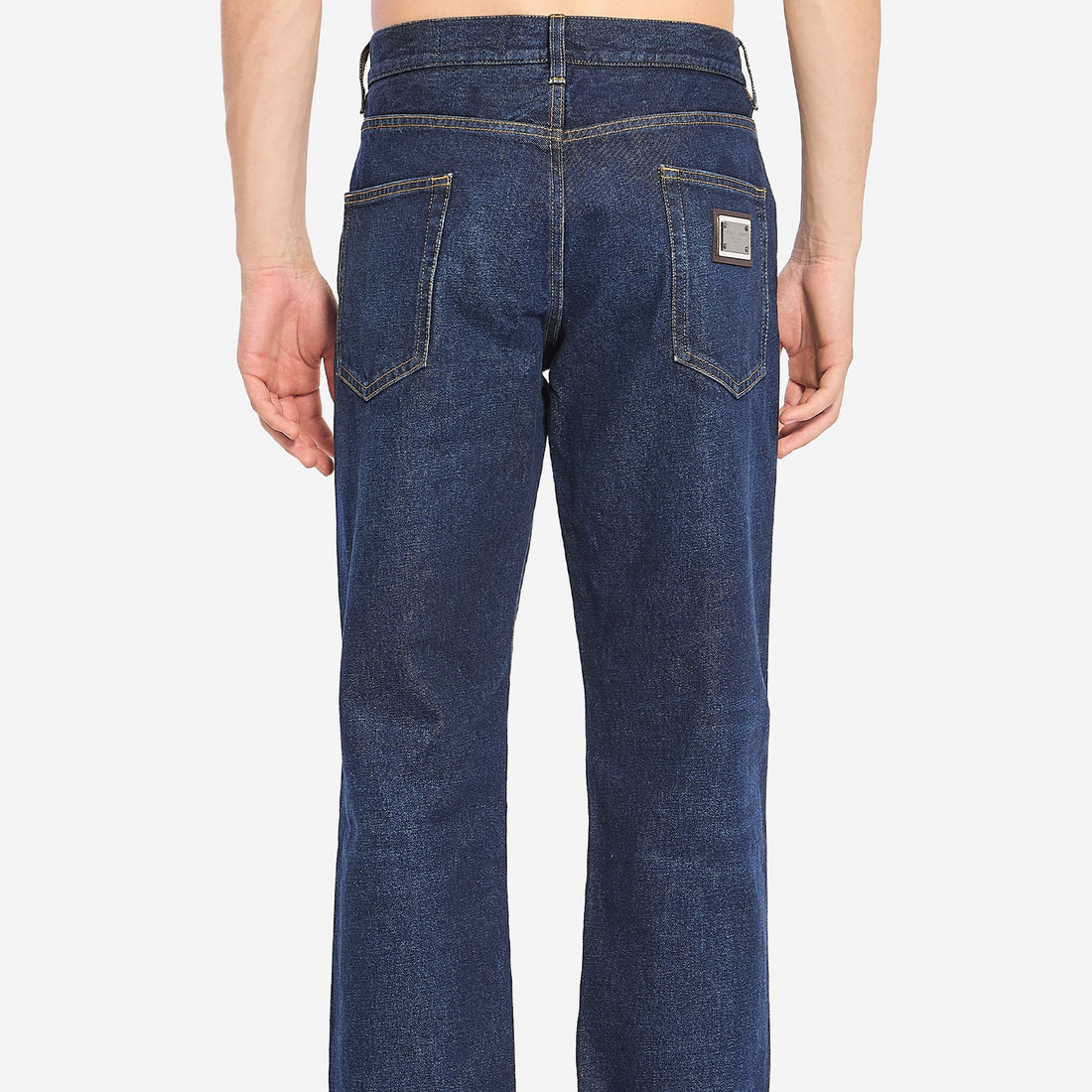 Denim pants with plaque
